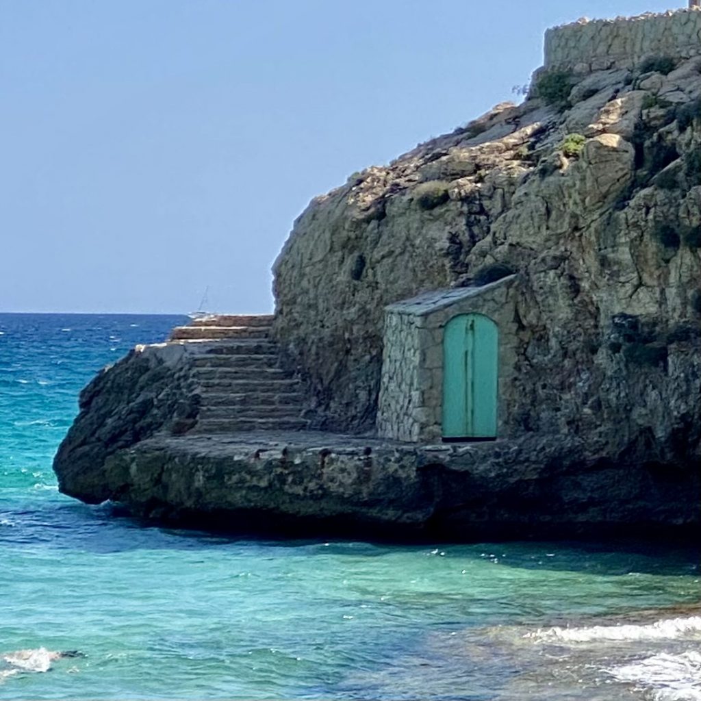 Green door in rocks